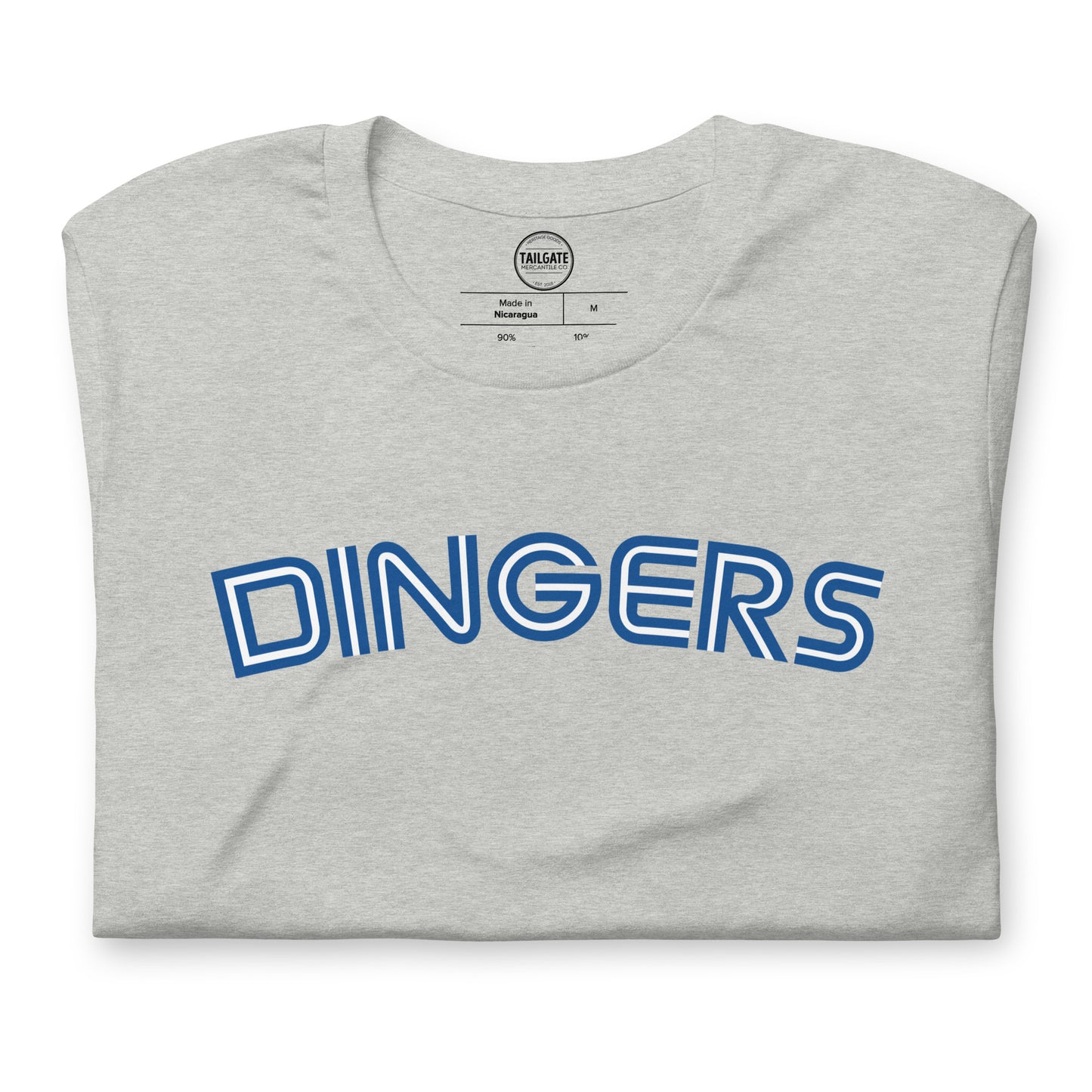 Close up image of heather athletic grey t-shirt with design of "DINGERS" in Toronto Blue Jays retro blue style font located on centre chest. This design is exclusive to Tailgate Mercantile and available only online.