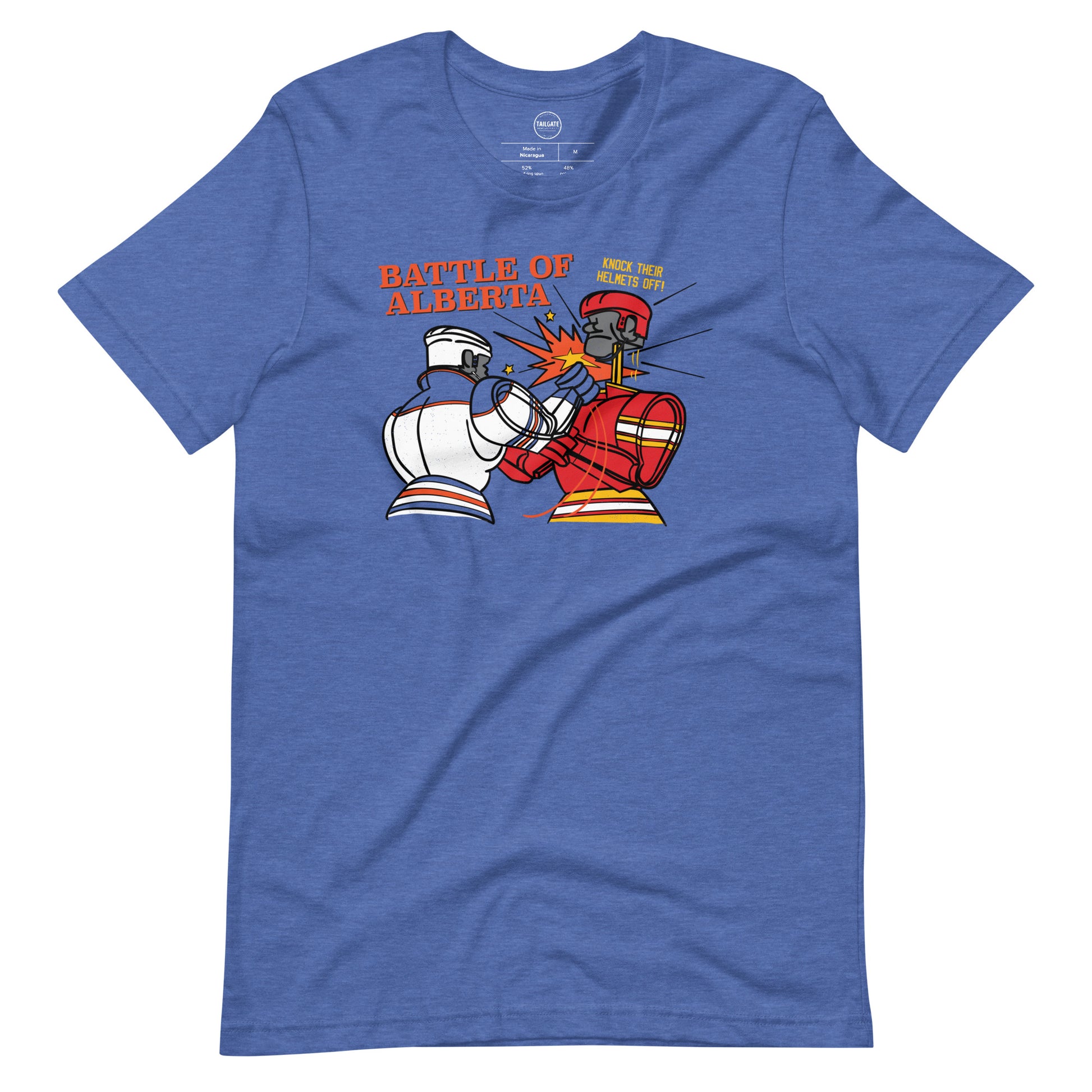 Image of heather royal blue t-shirt with design of "Battle of Alberta" with rock'em, sock'em style hockey players fighting located on centre chest. Players in the design are completed in NHL Calgary Flames and Edmonton Oilers colours. This design is exclusive to Tailgate Mercantile and available only online.
