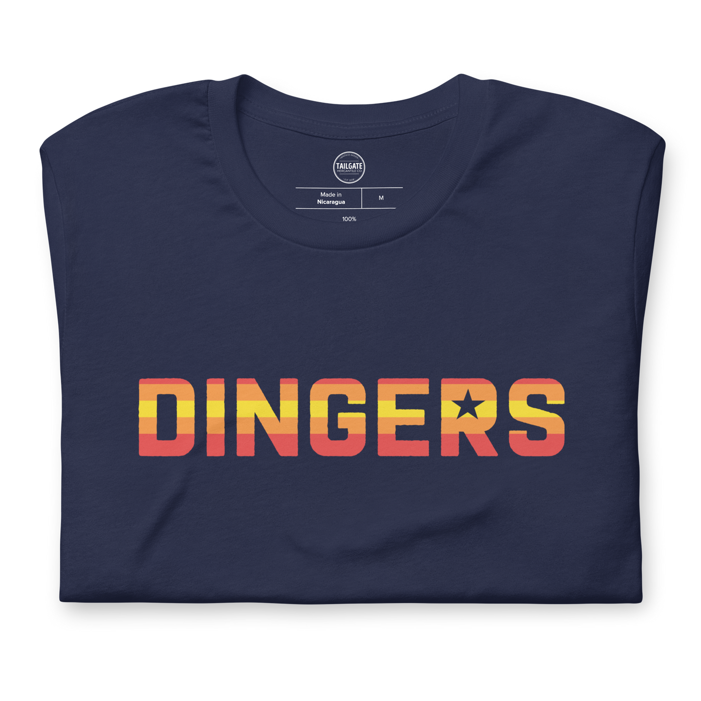 Close up image of navy t-shirt with design of "DINGERS" in Houston Astros tequila sunrise style font located on centre chest. This design is exclusive to Tailgate Mercantile and available only online.