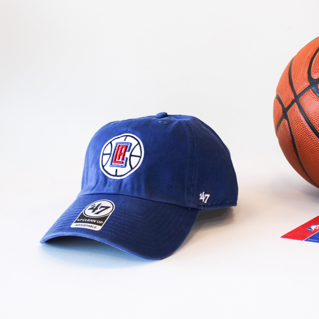 Image of royal blue clean up style hat with embroidered NBA LA Clippers logo on front.
