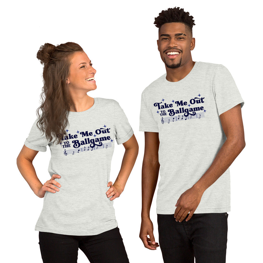 Image of young woman and young man wearing heather ash t-shirt with design of "Take Me Out to the Ballgame" with coordinating musical notes in navy located on centre chest. This design is exclusive to Tailgate Mercantile and available only online.