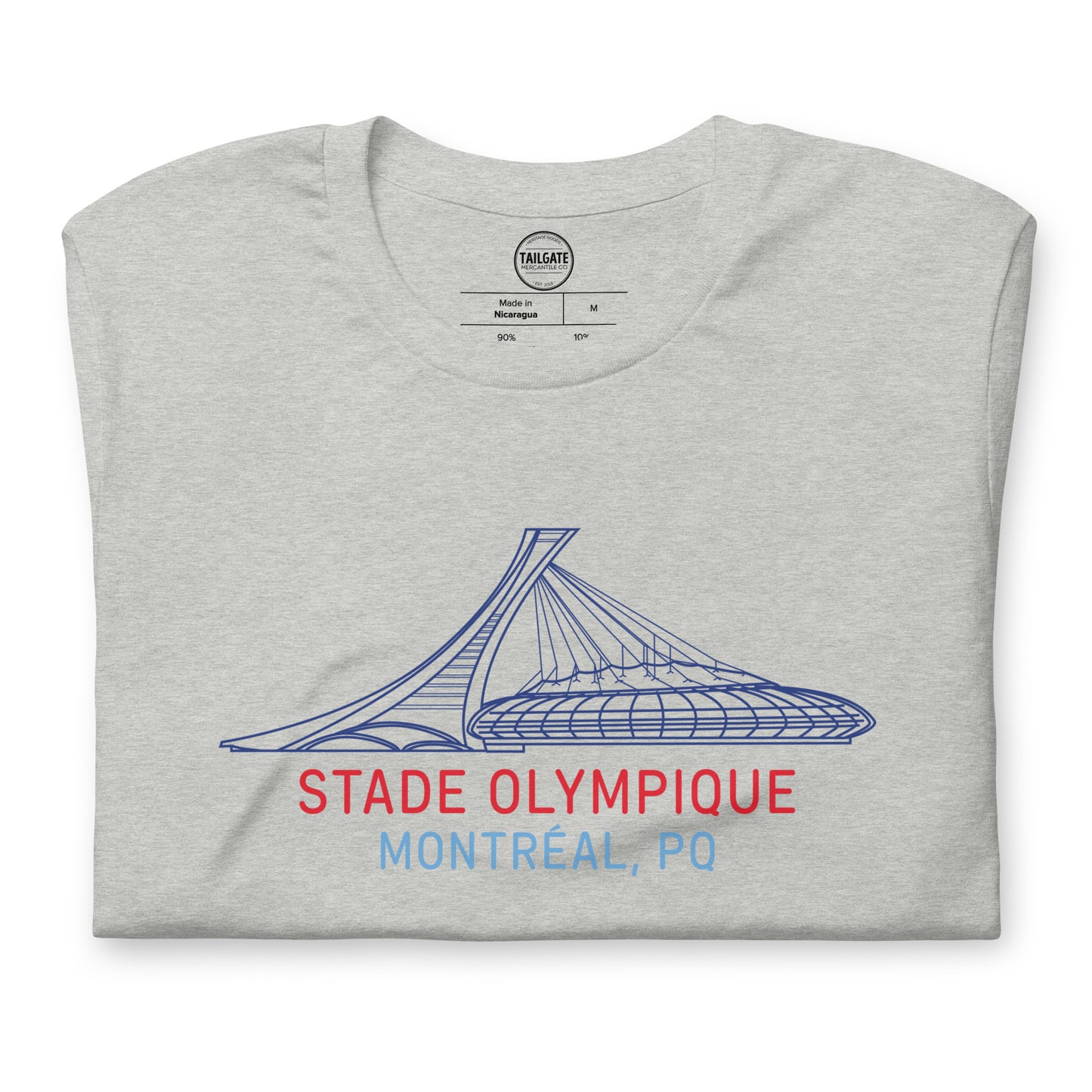 Close up image of heather athletic grey t-shirt with design of "Stade Olympique, Montreal, PQ" illustrated ballpark completed in retro Montreal Expos colours located on centre chest. This design is exclusive to Tailgate Mercantile and available only online.