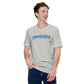 Image of young man wearing heather athletic grey t-shirt with design of "DINGERS" in Toronto Blue Jays retro blue style font located on centre chest. This design is exclusive to Tailgate Mercantile and available only online.