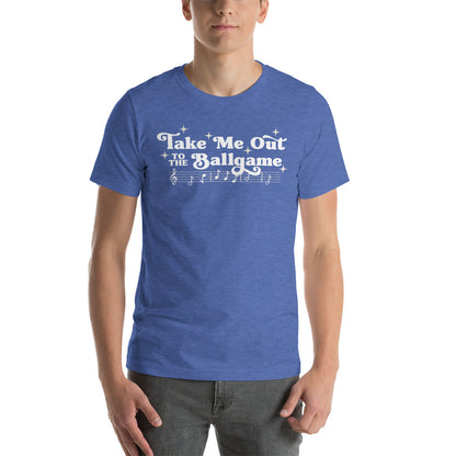 Image of man wearing heather royal blue t-shirt with design of "Take Me Out to the Ballgame" with coordinating musical notes in white located on centre chest. This design is exclusive to Tailgate Mercantile and available only online.