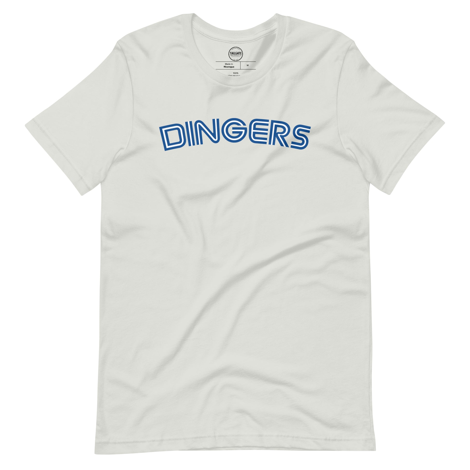 Image of silver t-shirt with design of "DINGERS" in Toronto Blue Jays retro blue style font located on centre chest. This design is exclusive to Tailgate Mercantile and available only online.