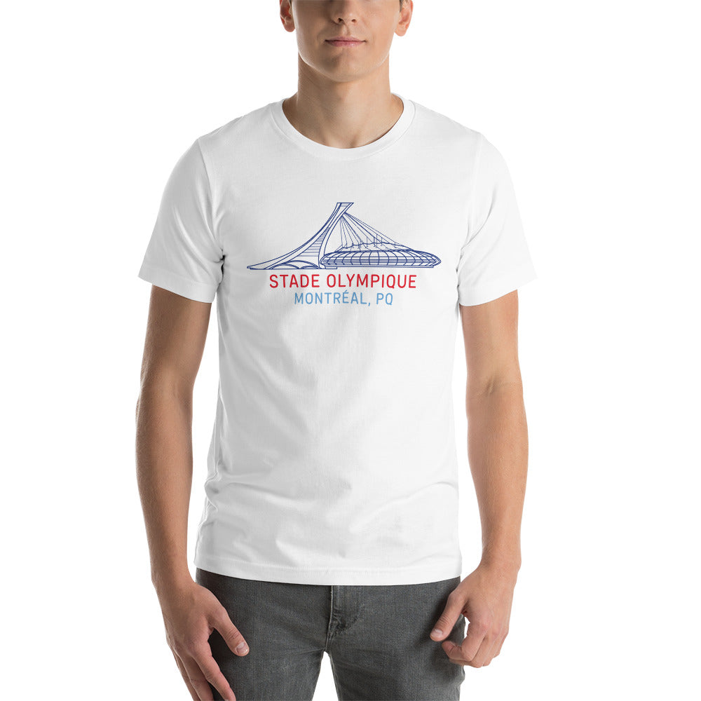 Image of man wearing white t-shirt with design of "Stade Olympique, Montreal, PQ" illustrated ballpark completed in retro Montreal Expos colours located on centre chest. This design is exclusive to Tailgate Mercantile and available only online.