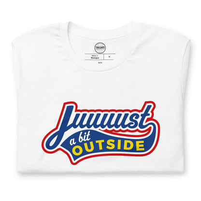Close up image of white t-shirt with design of "Juuuust a bit Outside" in blue/red/yellow located on centre chest. Just a Bit Outside is an homage to the great baseball movie "Major League". This design is exclusive to Tailgate Mercantile and available only online.